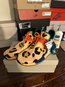 Multiple pair of Adidas Human Races