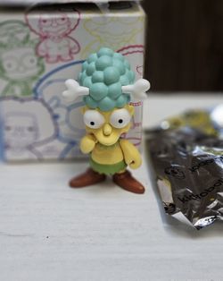 Kidrobot The Simpsons Series 2 Sideshow Mel 3-inch vinyl collectible figure.