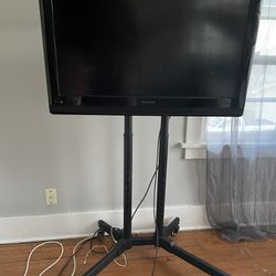 Tv And Rolling Stand
