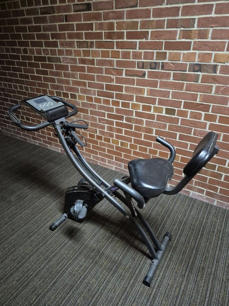 EXERCISE BIKE ADJUSTS TO DIFFERENT POSITIONS & FOLDS UP & THE MONITOR WORKS