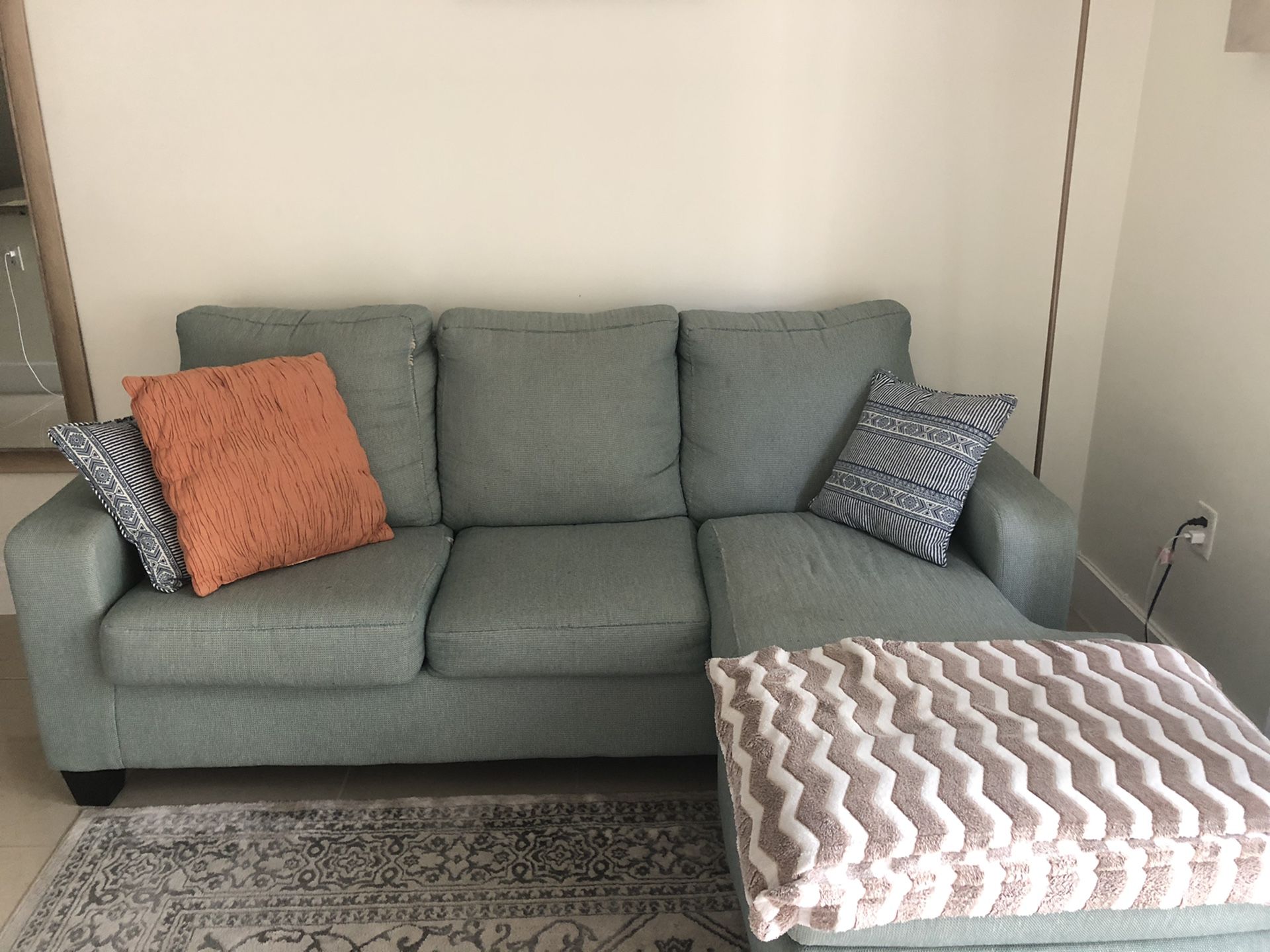 Baby blue L shaped couch