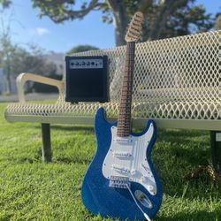 Electric Guitar and speaker Hardly used.
