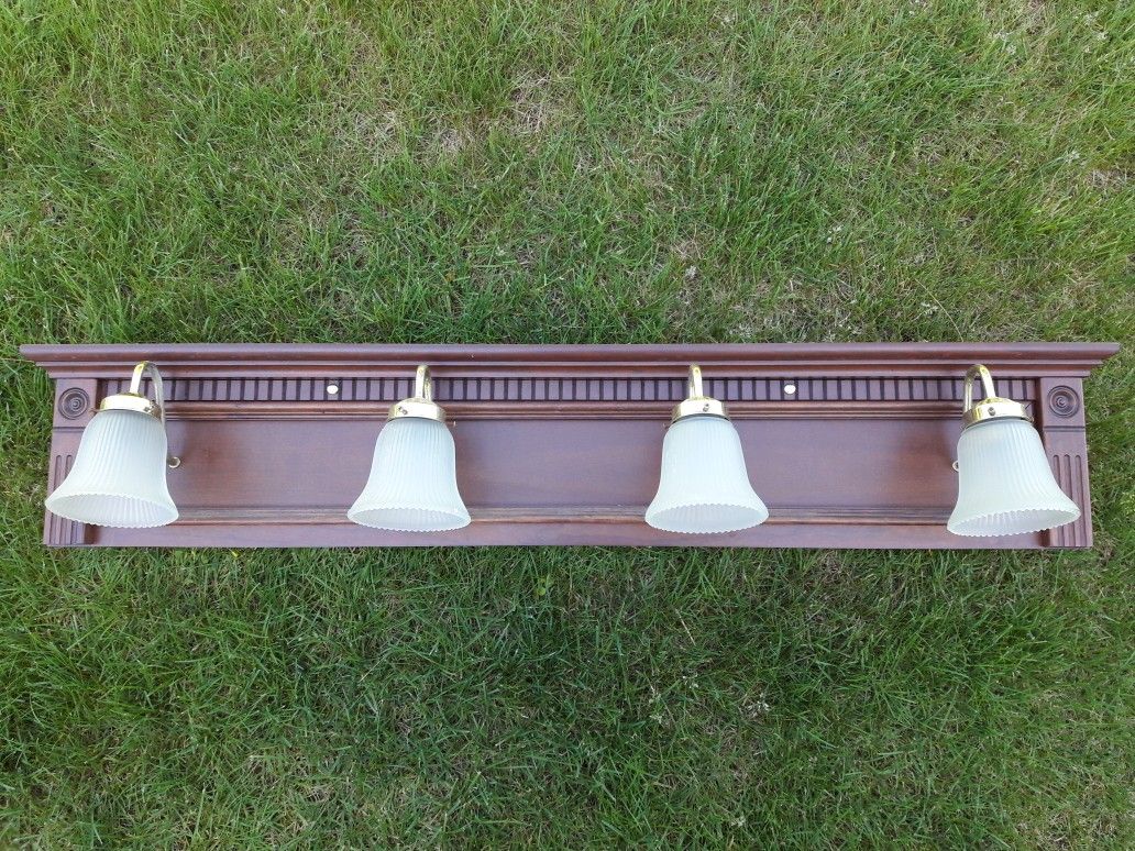 FOUR LIGHT-COVERED FIXTURE.