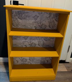 Cute yellow bookshelf - pending