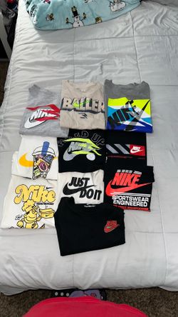 Boys size large Nike shirts total of 10
