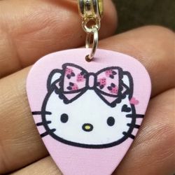 Hello Kitty Pink Bow on Pink Guitar Pick Necklace with White Rolled Cord