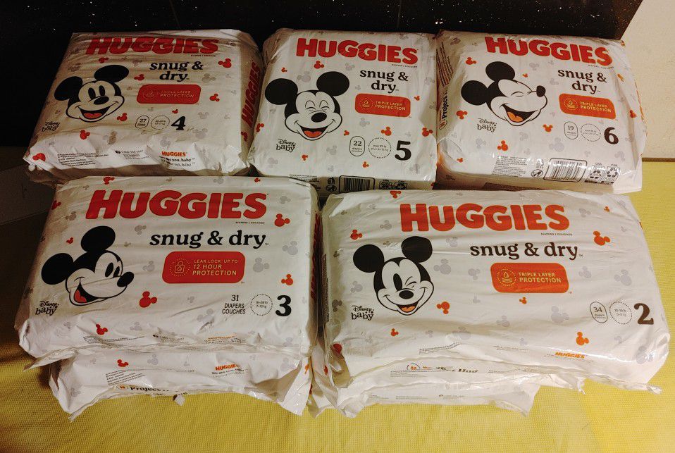 Huggies snug & Dry Diapers Size Available:  5, 4, 3 and 2