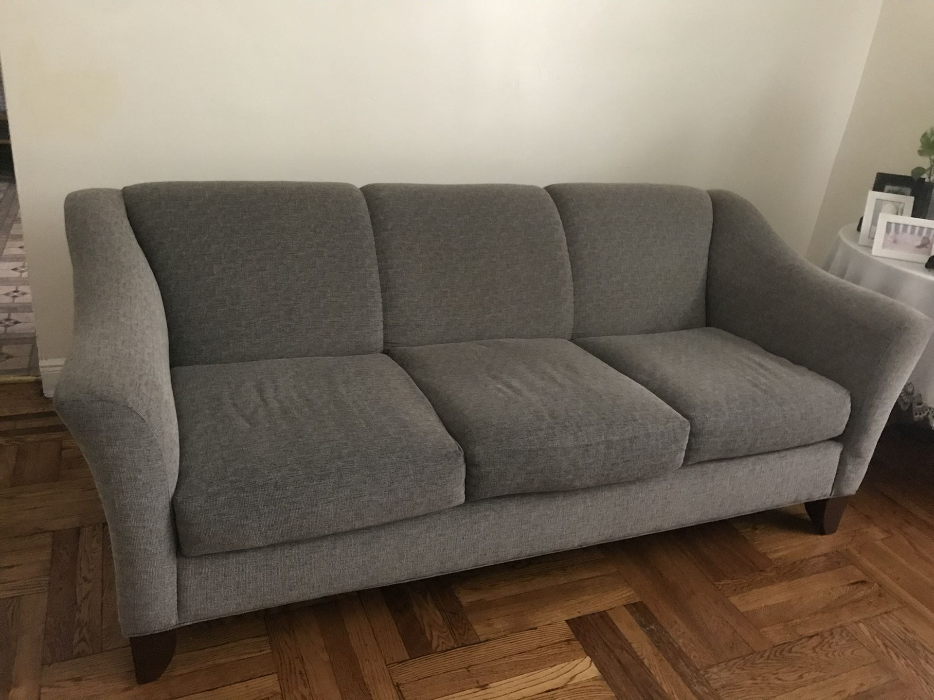 Cozy Grey Three-Seater Sofa