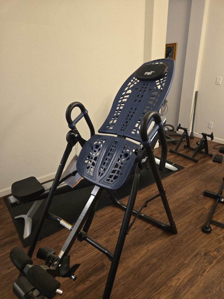 Teeter Hang Up Machine