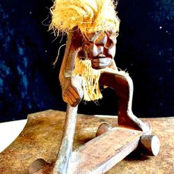 Original, traditional Hawaiian wood sculpture / figurine Skateboarder H6xL6xW4 inch Lbs 0.27 Handcrafted traditional Hawaiian wood figurine Skateboard