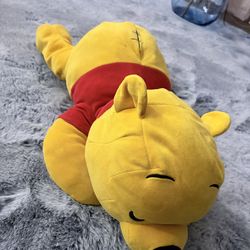 Pooh sleeping plush