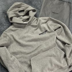 GREY ESSENTIALS HOODIE