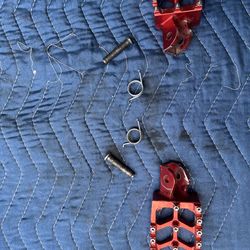 Red aftermarket pegs