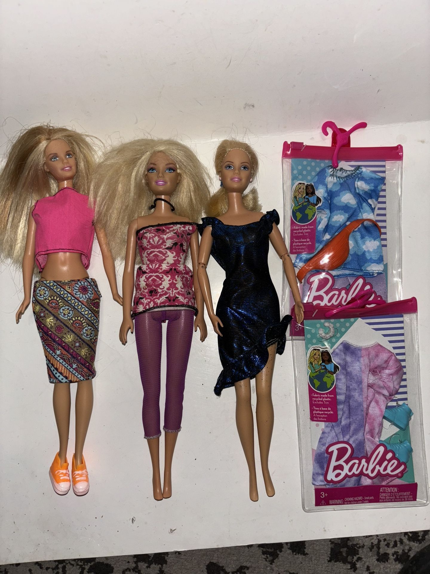 3 Barbies