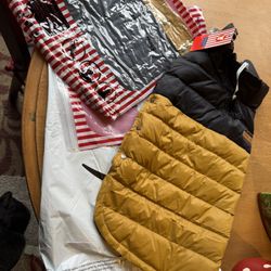 2 new dog coats. Bought on Amazon too small for my dogs. 16” from collar to butt. Only $10 for both. Rochester wa. 