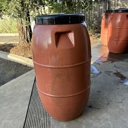 55 Gal Red Plastic Barrels