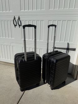 Set of 2 Black Hard Shell Spinner Luggage (150$ for both)