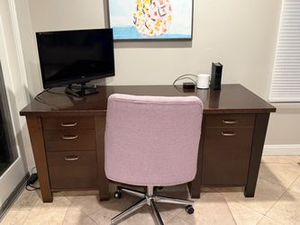 Brown wood executive desk
