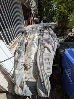 Older inflatable dinghy with launching wheels