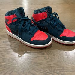 Pine Green and Red High-Top Jordan’s shoes 