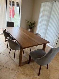 Dining room table with chairs