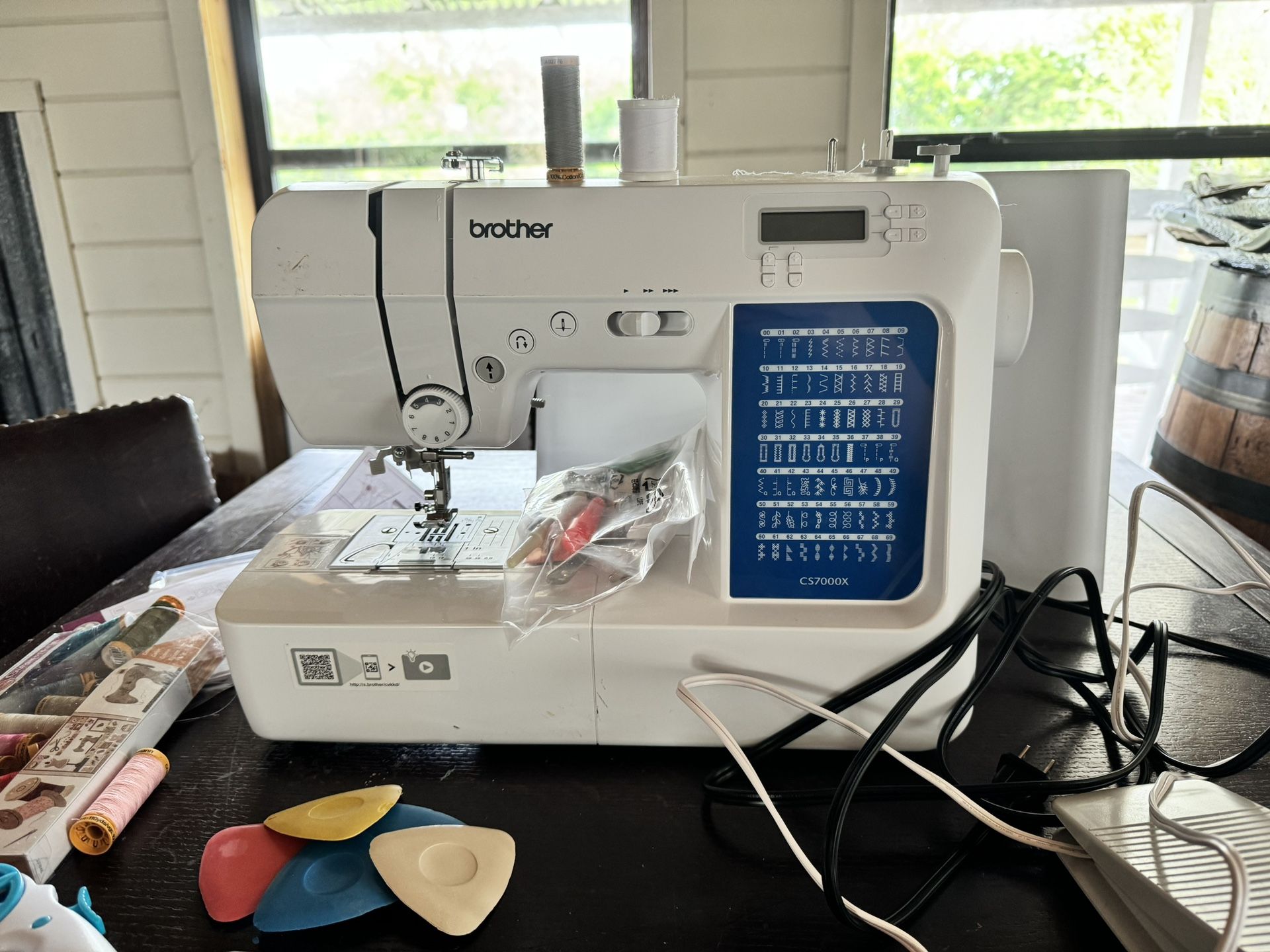 Brother CS7000X sewing machine with lots of accessories