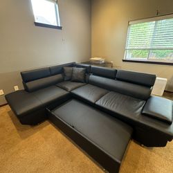 Faux Leather Couch With A Pull Out 