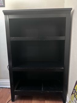 1 black book shelf and 2 small light brown-finish drawers for sale!