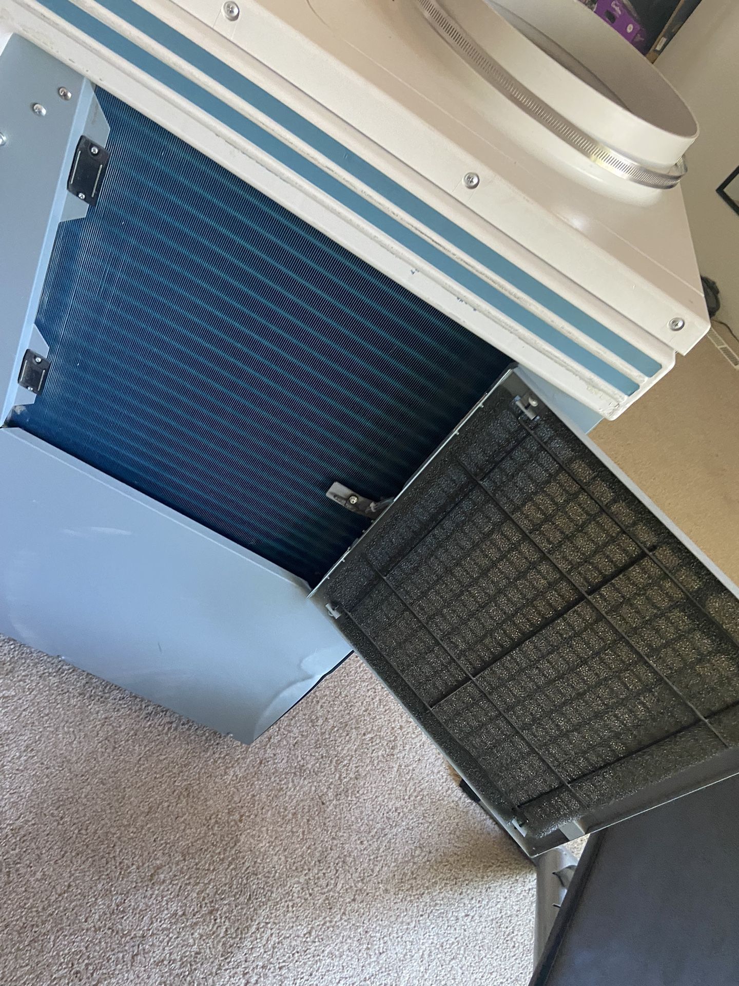 1 ton portable air conditioner/ heater. MOVINCOOL climate pro 12 for