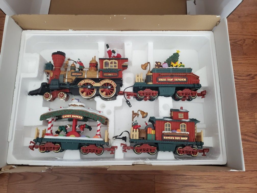 The HOLIDAY EXPRESS Animated Christmas Train Set In Box for Sale
