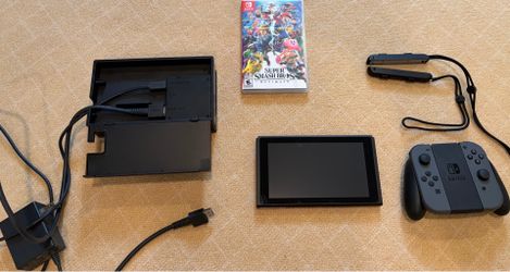 Nintendo Switch + Super Smash Bros Ultimate