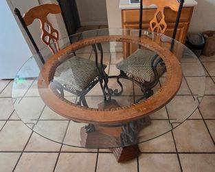 Round Glass Top Dining Table with Wrought Iron Base