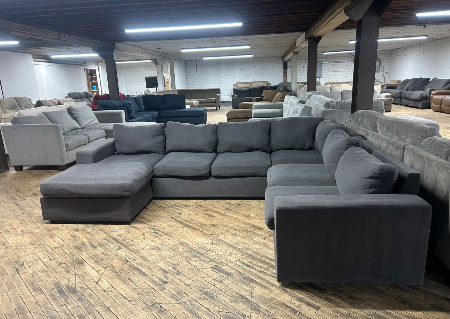 Delivery available gray 4-pc sectional couch