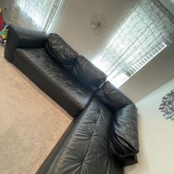 Well Used Black Couch