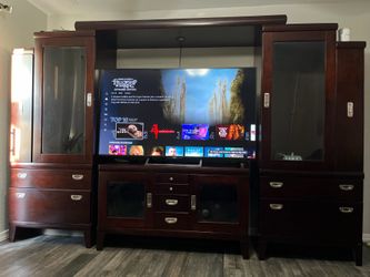 Nice solid wood entertainment center