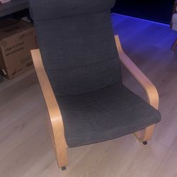 Modern Chair Made Of Wood And Grey Material