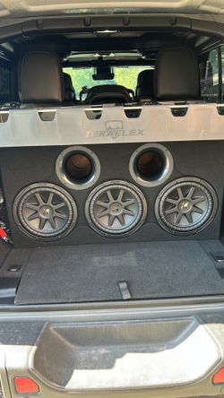 Three Kicker Comp CVX 10 inch subwoofers in custom box