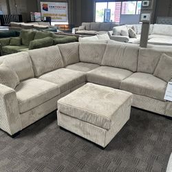 Taupe Corduroy Sectional And Ottoman 