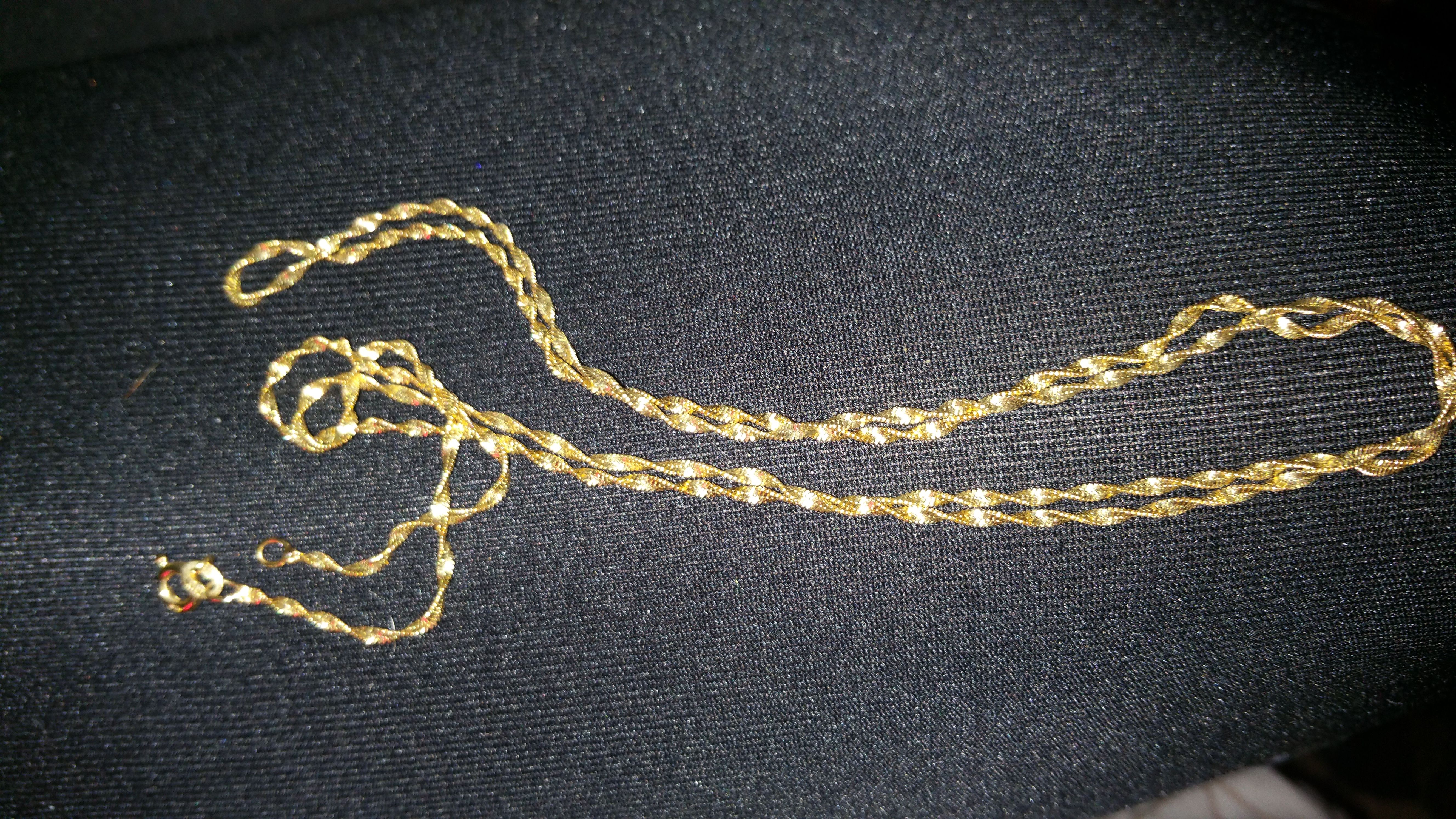 Sterling silver gold colored long chain necklace I'm guessing it's 24 to 26 inches long