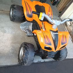 Kawasaki 4 Wheel Motorcycle, $25