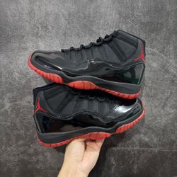 Air Jordan 11 Low. Negro/rojo 