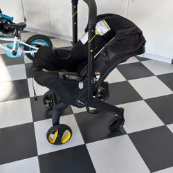 Very Minimally Used Doona Car Seat With Base 