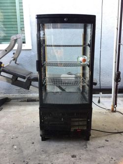 Mini fridge ((Tall 37"x 17" wide))