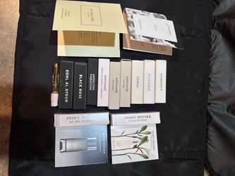 14 sample size perfumes. Mixed designers