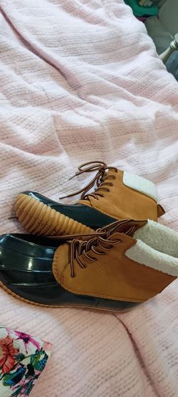 Women's duckies boots isolated