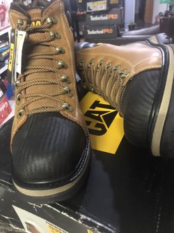Caterpillar// work boots// steel toe // size (12)(13)only