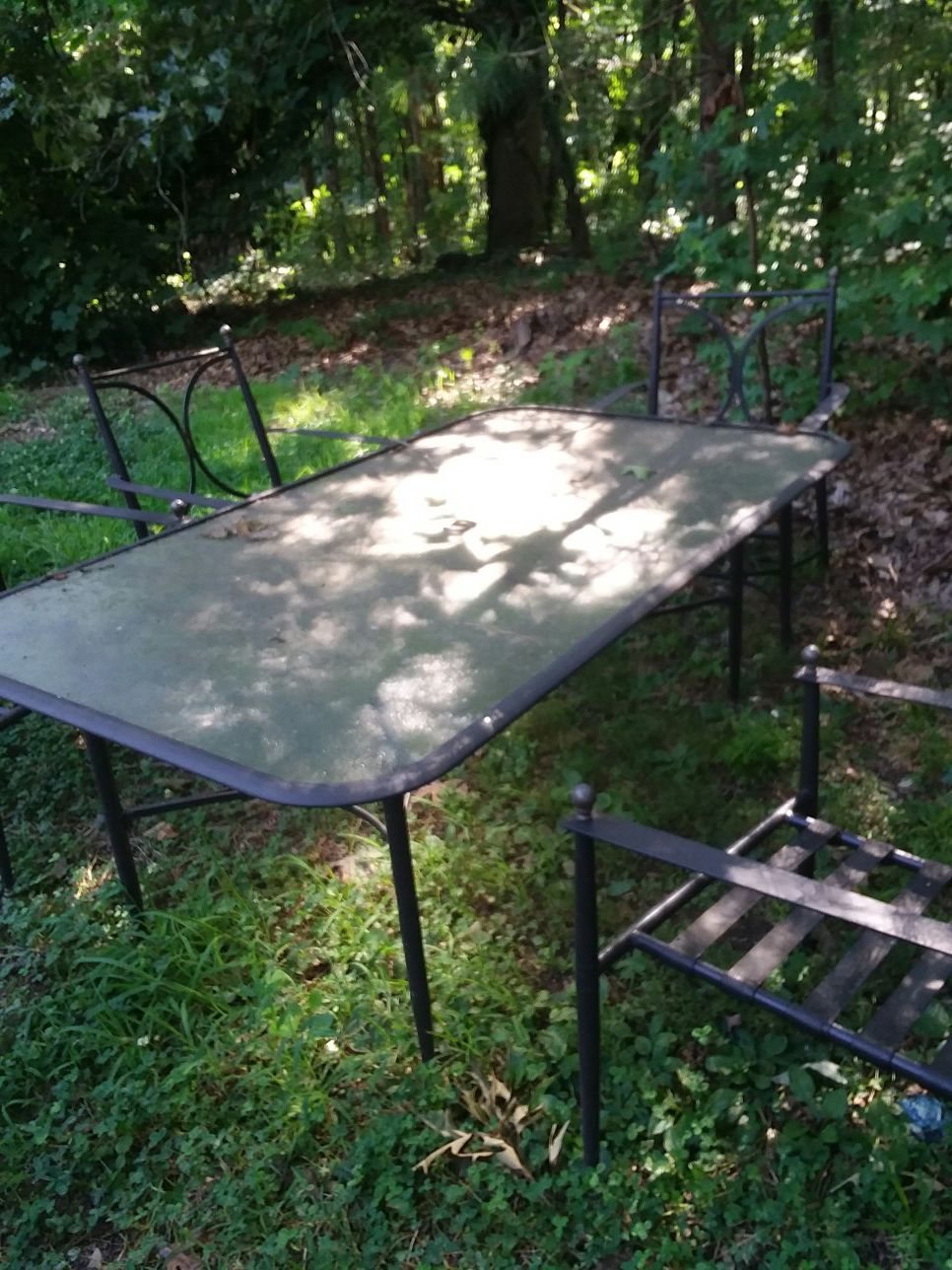 Glass patio table with 6 chairs