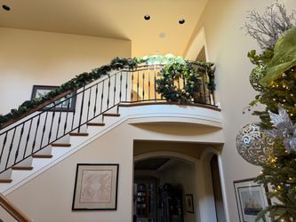 Christmas tree with decorations, wreath and garland