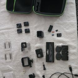 GoPro Hero 7 Camera, Batteries, Case Accessories 