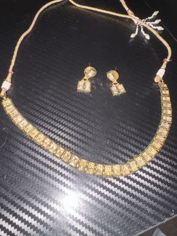 gold-plated kundan necklace and earring set